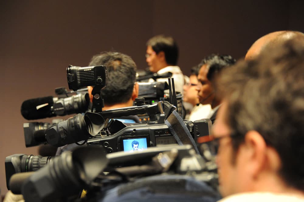 Cameras at a Press Conference